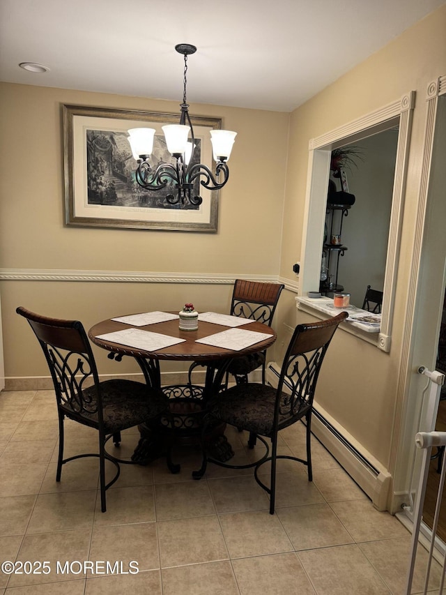 16B Robin St Unit 16B, Manchester, NJ 08759 - dining room featuring a chandelier, light tile patterned floors, a baseboard heating unit, and baseboards