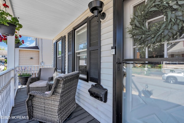 wooden terrace with covered porch