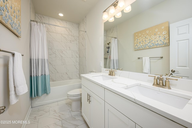 bathroom featuring marble finish flooring, shower / bath combo with shower curtain, toilet, double vanity, and baseboards
