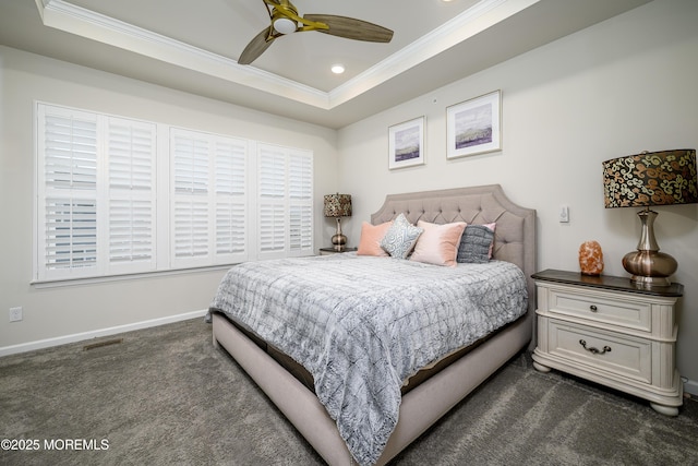 bedroom featuring crown molding, dark carpet, a tray ceiling, baseboards, and recessed lighting