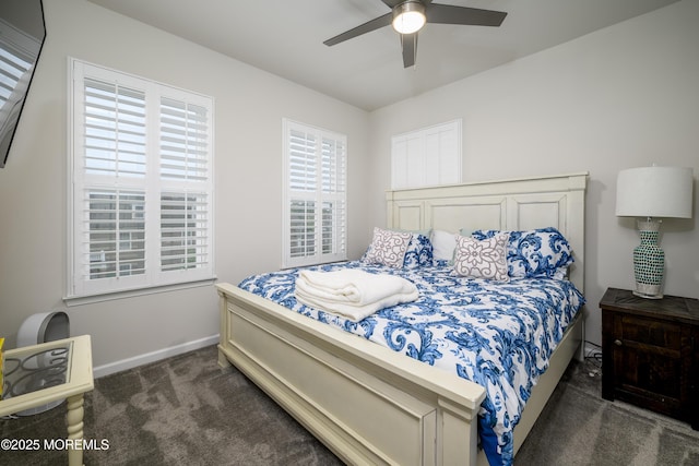 carpeted bedroom with baseboards and a ceiling fan