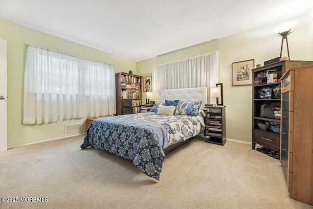 bedroom with carpet flooring and baseboards