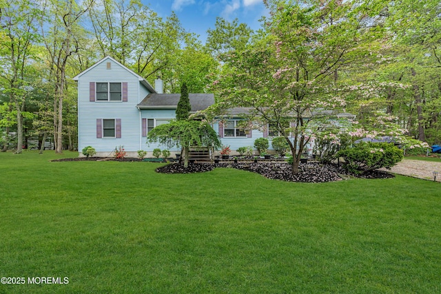 441 E Bird Village Rd, Jackson, NJ 08527 - view of front facade featuring a chimney, a front yard, and a shingled roof