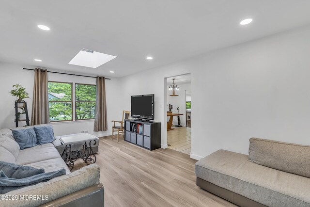 441 E Bird Village Rd, Jackson, NJ 08527 - living area with a skylight, light wood-type flooring, recessed lighting, and baseboards