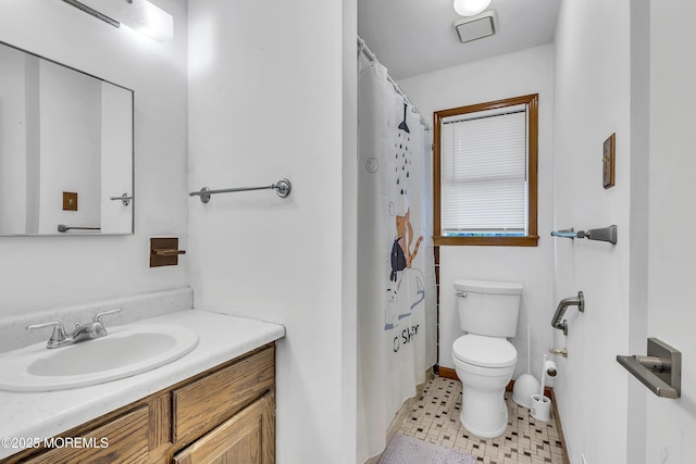441 E Bird Village Rd, Jackson, NJ 08527 - bathroom with toilet, vanity, and baseboards