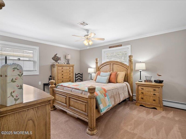 bedroom with light colored carpet, crown molding, a baseboard heating unit, and a ceiling fan