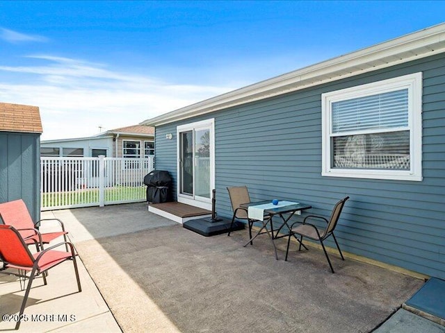 view of patio / terrace with fence and grilling area