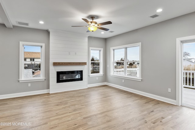 42 W Mohawk Dr, Little Egg Harbor, NJ 08087 - unfurnished living room with light wood-style floors, ceiling fan, baseboards, and recessed lighting