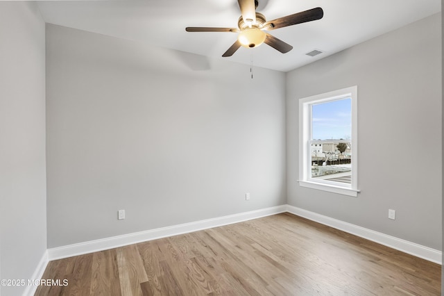 42 W Mohawk Dr, Little Egg Harbor, NJ 08087 - empty room featuring wood finished floors, baseboards, and a ceiling fan