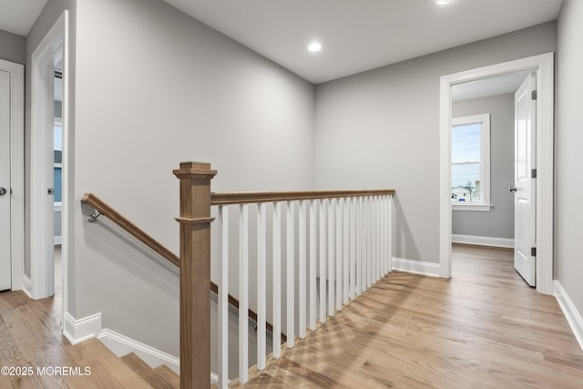 42 W Mohawk Dr, Little Egg Harbor, NJ 08087 - corridor with an upstairs landing, wood finished floors, baseboards, and recessed lighting