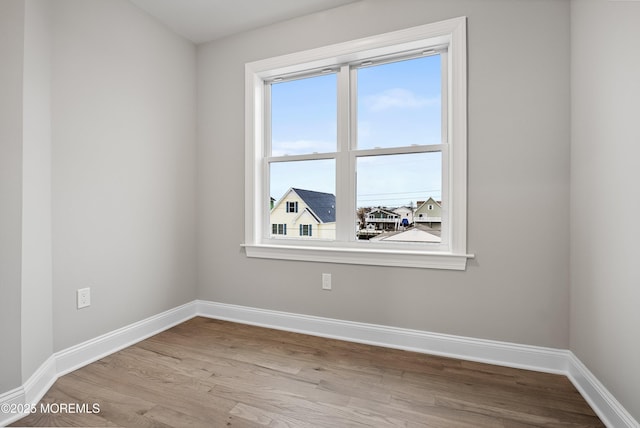 42 W Mohawk Dr, Little Egg Harbor, NJ 08087 - unfurnished room with wood finished floors and baseboards