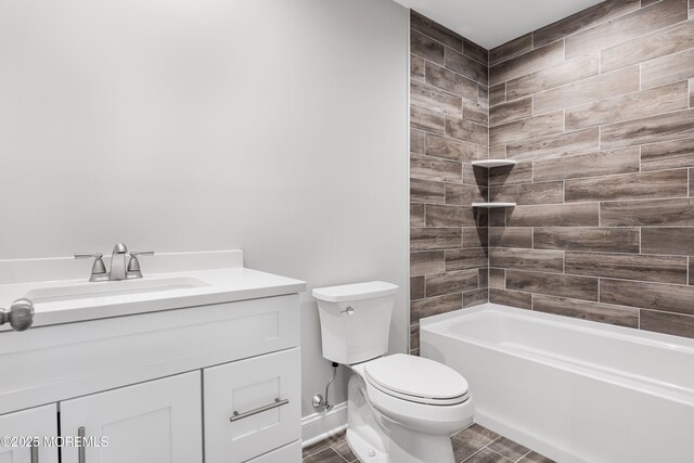 42 W Mohawk Dr, Little Egg Harbor, NJ 08087 - bathroom featuring toilet, vanity, and shower / washtub combination
