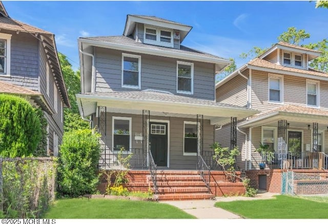 1031 3rd Ave, Asbury Park, NJ 07712 - traditional style home featuring covered porch