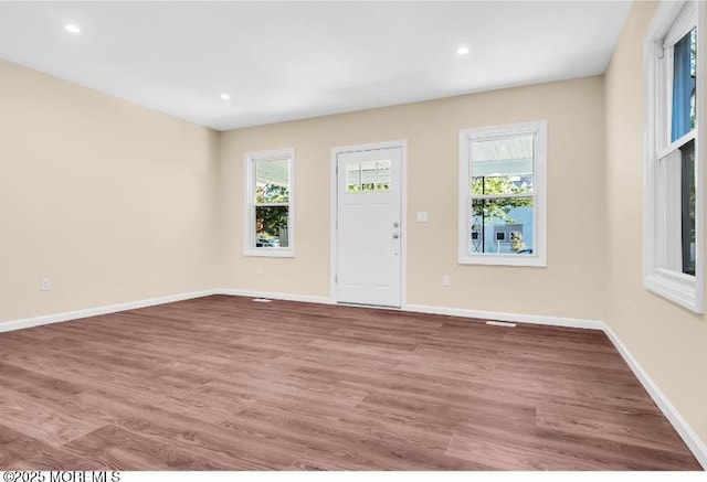 1031 3rd Ave, Asbury Park, NJ 07712 - foyer entrance with wood finished floors, healthy amount of natural light, baseboards, and recessed lighting