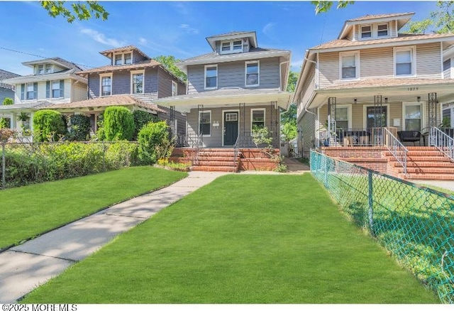 1031 3rd Ave, Asbury Park, NJ 07712 - american foursquare style home featuring a porch and stairway