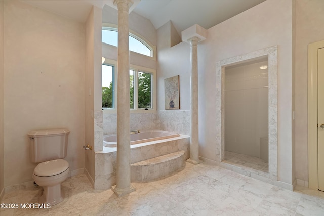 bathroom with toilet, a bath, decorative columns, tiled shower, and lofted ceiling