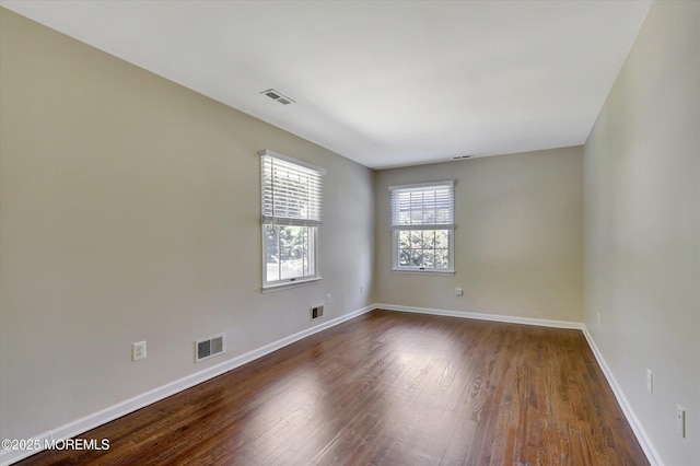 5 Eagle Hill Rd, Holmdel, NJ 07733 - empty room with dark wood-style flooring