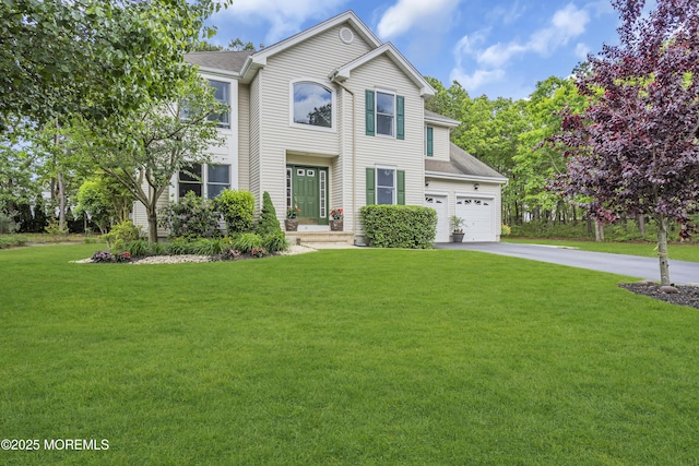 13 Dori Ln, Barnegat, NJ 08005 - traditional home with asphalt driveway, a front lawn, an attached garage, and a shingled roof