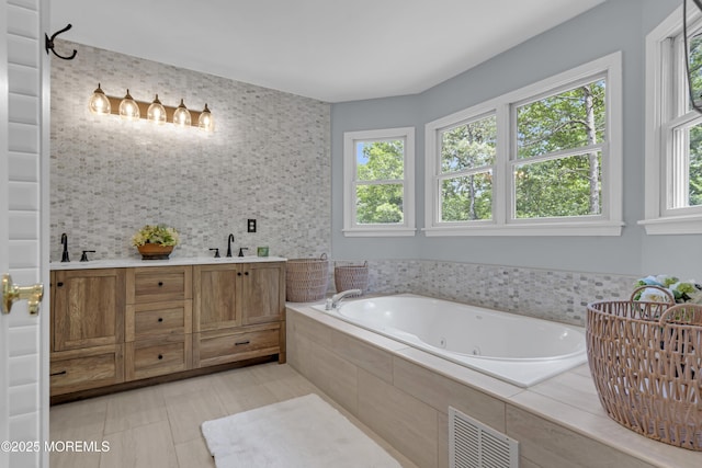 13 Dori Ln, Barnegat, NJ 08005 - bathroom featuring a jetted tub, double vanity, and tile patterned flooring