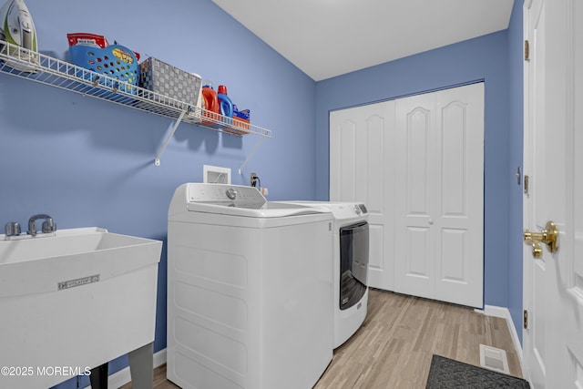 13 Dori Ln, Barnegat, NJ 08005 - laundry room with separate washer and dryer, light wood-type flooring, and baseboards