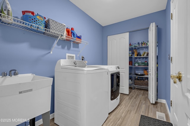 13 Dori Ln, Barnegat, NJ 08005 - laundry room with washing machine and clothes dryer, light wood-style flooring, and baseboards