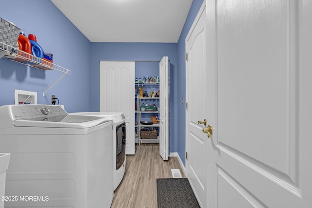 13 Dori Ln, Barnegat, NJ 08005 - laundry area with washer and dryer, light wood finished floors, and baseboards