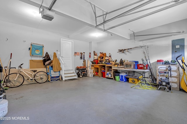 13 Dori Ln, Barnegat, NJ 08005 - garage with a garage door opener, a workshop area, and electric panel