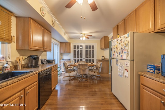 kitchen featuring dishwasher, ceiling fan, freestanding refrigerator, dark wood finished floors, and ornamental molding