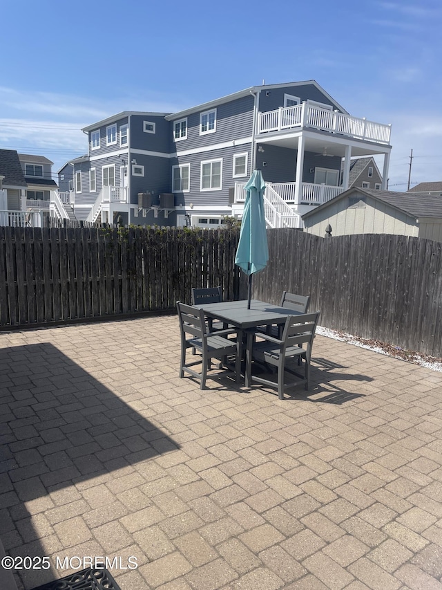 100 Vance Ave, Lavallette, NJ 08735 - view of patio with fence, outdoor dining space, and a residential view