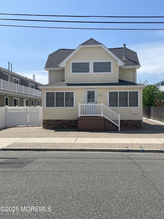 100 Vance Ave, Lavallette, NJ 08735 - traditional home featuring fence and a shingled roof