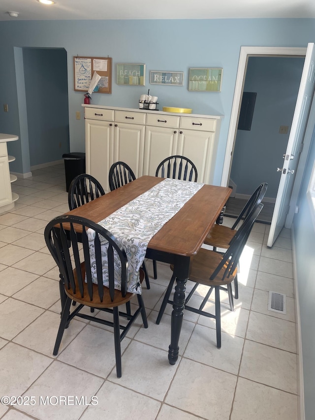 100 Vance Ave, Lavallette, NJ 08735 - dining area featuring light tile patterned flooring and baseboards