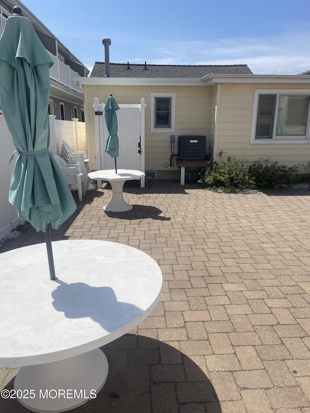 100 Vance Ave, Lavallette, NJ 08735 - view of patio with fence and cooling unit