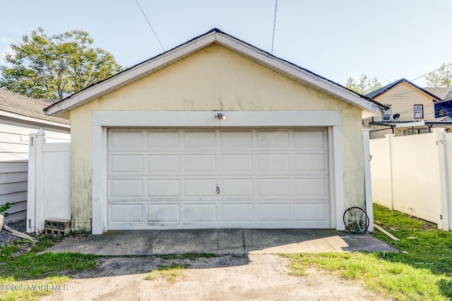 detached garage with fence
