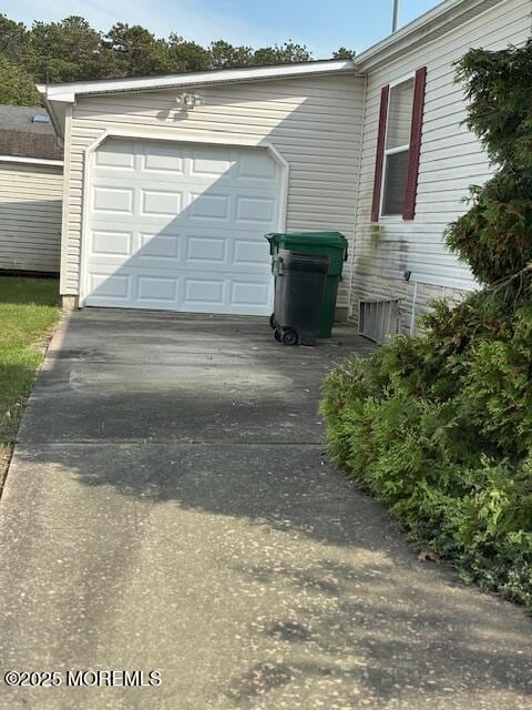 garage with driveway