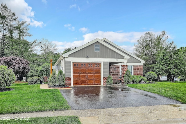 23 Lambeth Ln, Manchester, NJ 08759 - single story home featuring brick siding, driveway, board and batten siding, and a front lawn