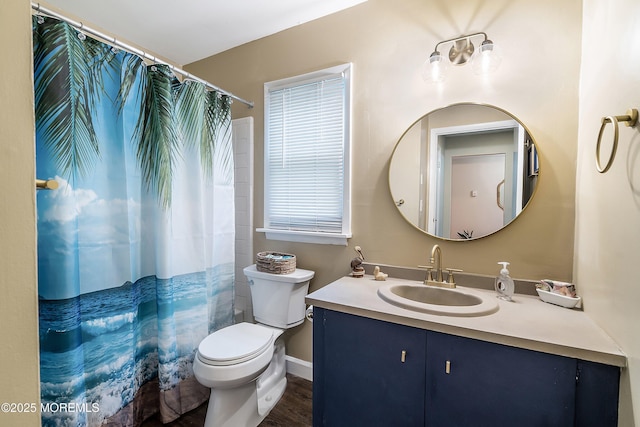23 Lambeth Ln, Manchester, NJ 08759 - bathroom with toilet, vanity, wood finished floors, baseboards, and curtained shower