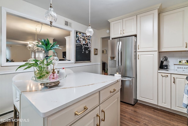 23 Lambeth Ln, Manchester, NJ 08759 - kitchen with stainless steel fridge with ice dispenser, dark wood-style flooring, pendant lighting, a kitchen island, and decorative backsplash