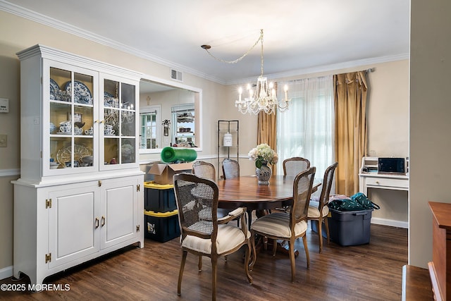 23 Lambeth Ln, Manchester, NJ 08759 - dining space with a chandelier, dark wood-type flooring, and ornamental molding