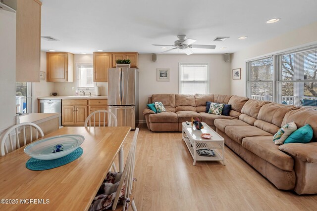 1255 W Mallard Dr, Stafford, NJ 08050 - living area featuring healthy amount of natural light, recessed lighting, light wood-style floors, and ceiling fan