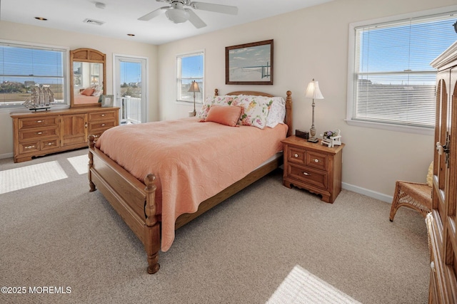 1255 W Mallard Dr, Stafford, NJ 08050 - bedroom featuring baseboards, light carpet, and a ceiling fan