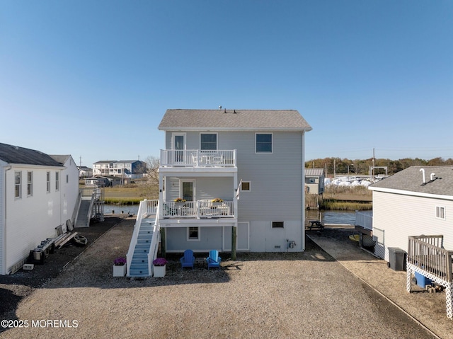 1255 W Mallard Dr, Stafford, NJ 08050 - rear view of property with stairs, a balcony, crawl space, and a water view