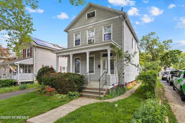 38 Bowne Ave, Freehold, NJ 07728 - traditional style home featuring covered porch and a front yard