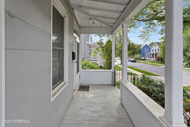 38 Bowne Ave, Freehold, NJ 07728 - view of patio with a porch and a residential view