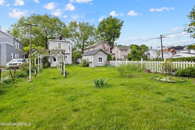 38 Bowne Ave, Freehold, NJ 07728 - view of yard with a shed, a residential view, and an outdoor structure