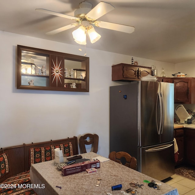 6 Conestoga Dr Unit C, Whiting, NJ 08759 - kitchen featuring freestanding refrigerator, ceiling fan, light countertops, light tile patterned floors, and dark brown cabinets
