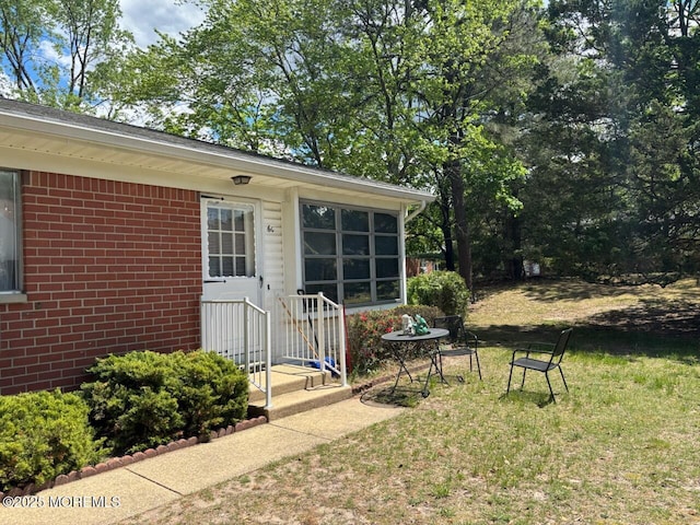6 Conestoga Dr Unit C, Whiting, NJ 08759 - entrance to property with a lawn and brick siding