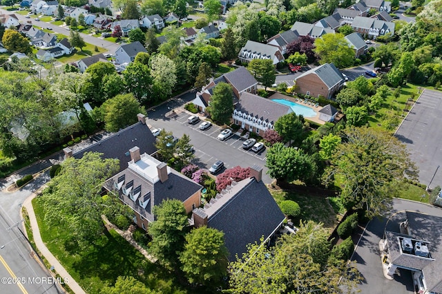 aerial view of residential area with a pool
