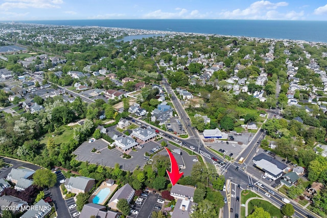 aerial overview of property's location featuring a large body of water