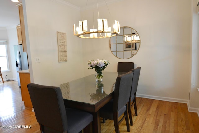 630 Springfield Ave, Pine Beach, NJ 08741 - dining space featuring a chandelier, crown molding, light wood finished floors, and baseboards