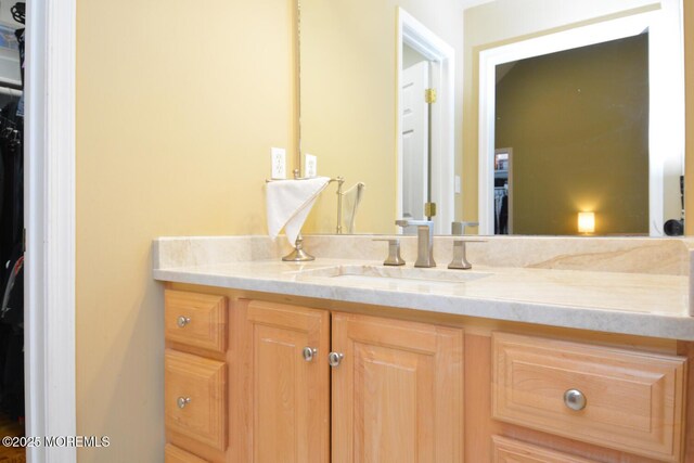630 Springfield Ave, Pine Beach, NJ 08741 - bathroom featuring vanity and a walk in closet